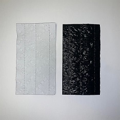 Item No 1439  Black & White 6 x 3 1/4 inch Soaker Pad  2,000 pack
